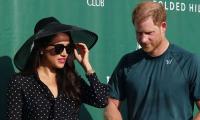 Meghan Markle claims 'dominance' over Prince Harry with peck in California
