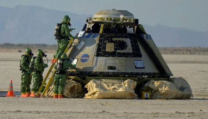 After touchdown, recovery teams detected hydrazine vapor around Starliner and had to back off until it cleared. Photo: AFP
