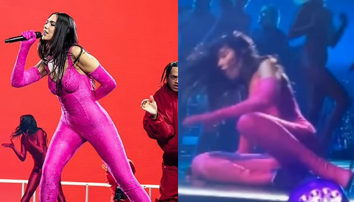 Dua Lipa helped to her feet by backing dancer after falling over on stage