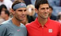 Collision course: Djokovic, Nadal roll into last 16 at French Open