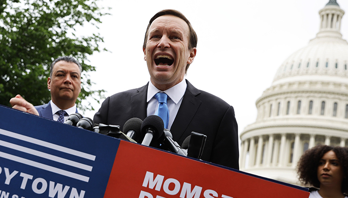 Senator Chris Murphy (D-CT) addresses a rally with fellow Senate Democrats and gun control advocacy groups outside the US Capitol on May 26, 2022, in Washington, DC. — AFP