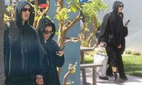 Kourtney Kardashian and Travis Barker cut a casual figure as they return home