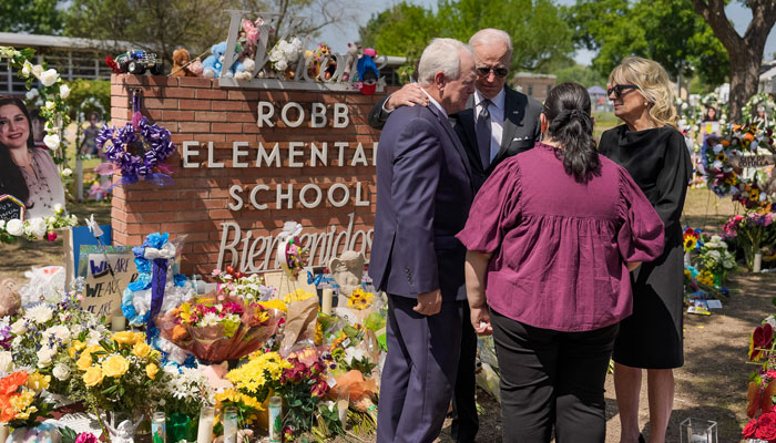 President Joe Biden and first lady Jill Biden visit a memorial at Robb Elementary School. Photo: Twitter/POTUS