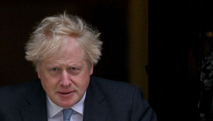 In this file photo, taken on May 13, 2022, Britains Prime Minister Boris Johnson exits 10 Downing Street in central London. Photo: AFP