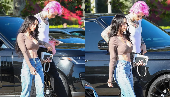 Megan Fox stuns in plunging crop top with her washboard abs on display