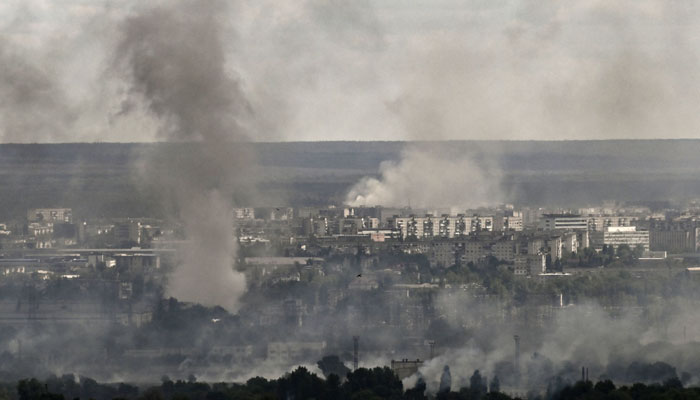 Smoke and dirt rise from shelling in the city of Severodonetsk during fight between Ukrainian and Russian troops in the eastern Ukrainian region of Donbas on June 7, 2022.  Photo: AFP