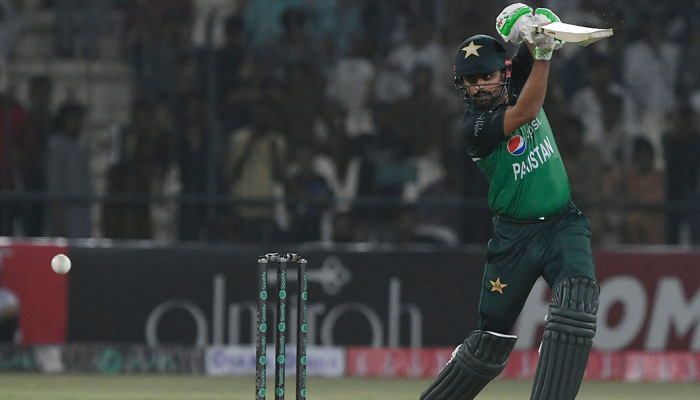 Pakistan´s captain Babar Azam plays a shot during the first one-day international (ODI) cricket match between Pakistan and West Indies at the Multan Cricket Stadium in Multan on June 8, 2022. AFP
