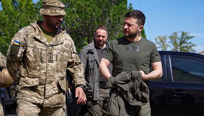 Ukrainian President Volodymyr Zelensky (R) visiting the frontline positions of the Ukrainian military during a working trip to the Zaporizhzhia region. Photo: AFP/File