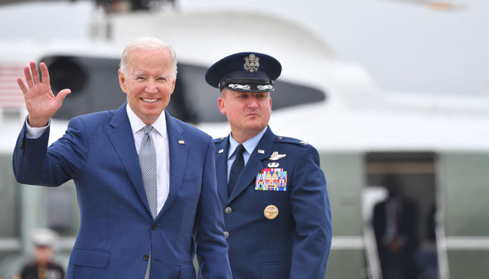 US President Joe Biden makes his way to board Air Force One before departing from Andrews Air Force Base in Maryland on at Joint Base Andrews, Maryland on June 14, 2022. Photo: AFP