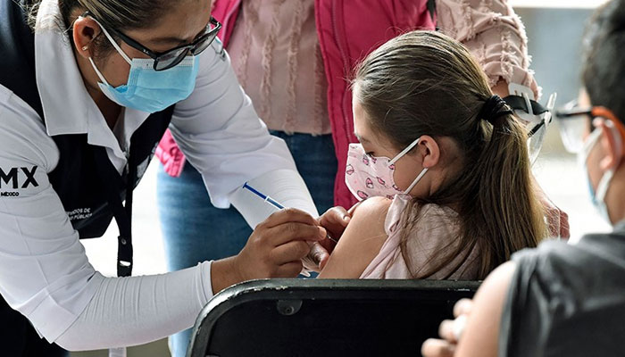 A child being vaccinated. Photo: AFP