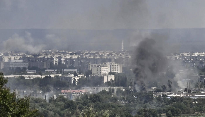 Smoke and dirt rise from the city of Severodonetsk in the eastern Ukrainian region of Donbas on Friday, as the Russian-Ukrainian war enters its 114th day. Photo: AFP