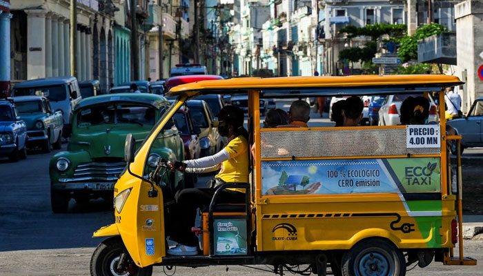 Electric vehicles are making an appearance in Cuba as fuel prices and US sanctions cripple traditional transport. Photo: AFP