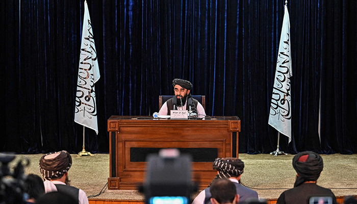 Taliban spokesman Zabiullah Mujahid addresses a press conference at government media and information center in Kabul city, on October 30, 2021. — AFP