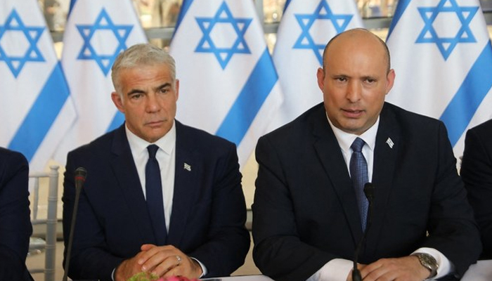 Israeli Prime Minister Naftali Bennett (R) and Foreign Minister Yair Lapid, attend a weekly cabinet meeting in Jerusalem. — AFP/File