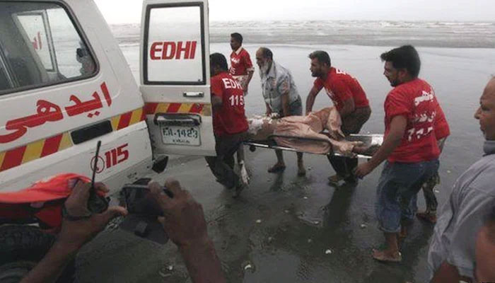 One man drowned and three others go missing at Karachis Clifton beach. Photo: Geo News/file