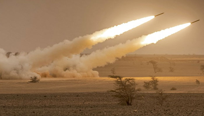 US M142 High Mobility Artillery Rocket System (HIMARS) launchers fire salvoes during the African Lion military exercise in the Grier Labouihi region in southeastern Morocco on June 9, 2021. Photo: AFP