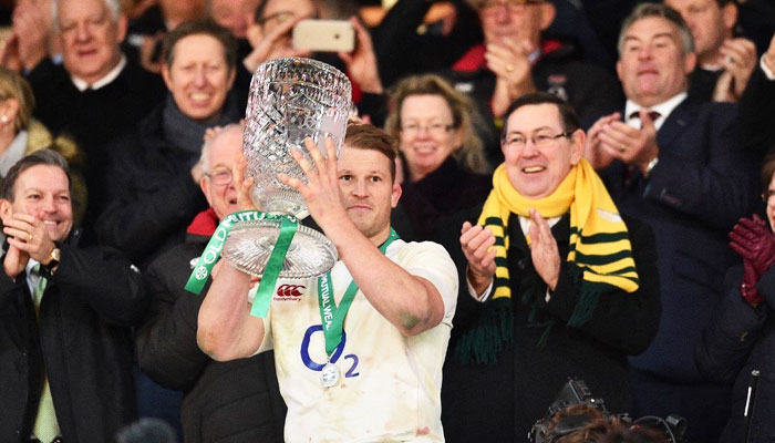 England’s captain Dylan Hartley lifts the Cook Cup after their victory at Twickenham, London, Dec 3, 2016. Photo: AFP