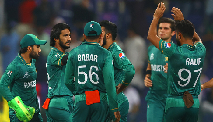 Pakistan players celebrate after taking a wicket in a match in this file photo.