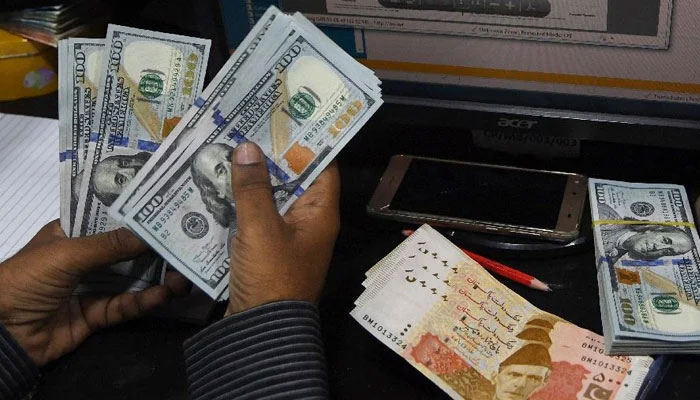 The Pakistani rupee gained Rs1.75 to close at Rs205.12 against the greenback in the interbank market.— AFP/File