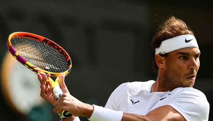 Centre Court star: Rafael Nadal returns the ball to Lithuanias Ricardas Berankis. Photo: AFP