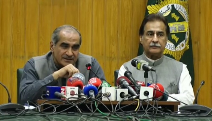 Minister for Railways Khawaja Saad Rafique (L) holding a press conference in Lahore on Sunday, July 3, 2022, alongside Federal Minister for Economic Affairs Sardar Ayaz Sadiq. — Screengrab via Twitter/@pmln_org