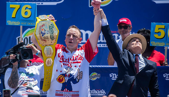 Hot dog eating champ wins again in July 4 contest in New York. Photo: ny1.com
