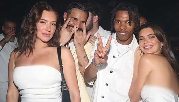 Kendall Jenner appears with Devin Booker, Drake and Lil Baby at Michael Rubins party