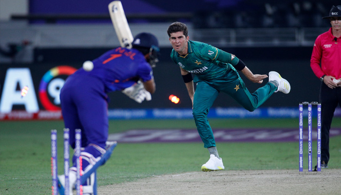 Pakistani pacer Shaheen ShahAfridi bowls out Indan batter during a match in the T20 World Cup played in Dubai in 2021.