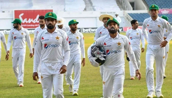 Skipper Babar Azam (left) and wicket-keeper batter Mohammad Rizwan (right) walk back to the pavilion after the innings end. — Twitter/File