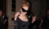 Nicole Kidman takes a leaf out of Kim Kardashian’s book as she sports Catwoman-style eyewear in Paris