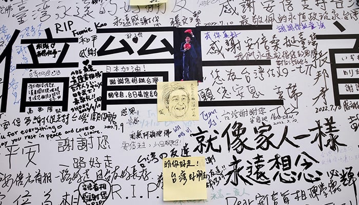 This picture shows condolence messages for former Japanese prime minister Shinzo Abe in front of the Japan-Taiwan Exchange Association office in Taipei on July 11, 2022. — AFP