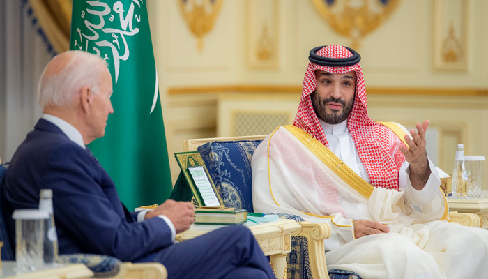A handout picture released by the Saudi Royal Palace on July 15, 2022, shows Saudi Crown Prince Mohammed bin Salman (R) meeting with US President Joe Biden at Al-Salam Palace in the Red Sea port of Jeddah. -AFP