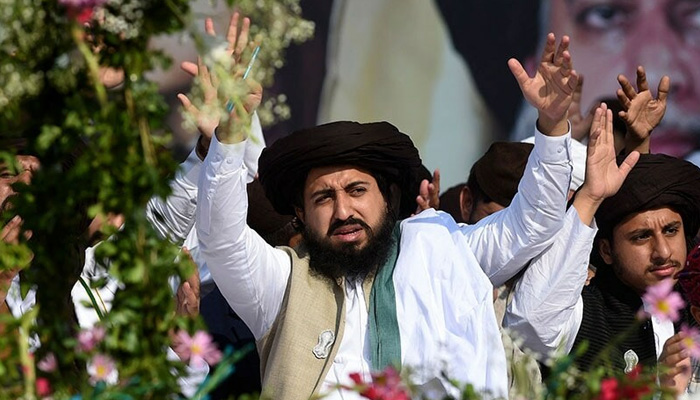 TLP chief Saad Rizvi waves to supporters during his father Khadim Hussain Rizvis death anniversary in Lahore on November 21, 2021. — AFP/File