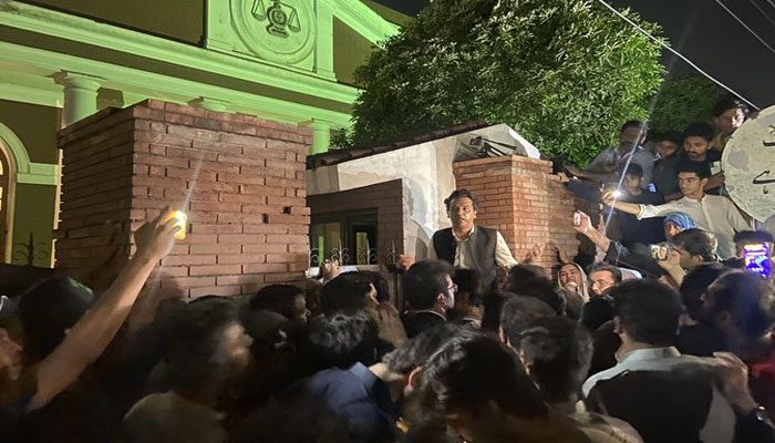 The PTIs workers gather at the SCs Lahore Registry late Friday night. Photo: Twitter