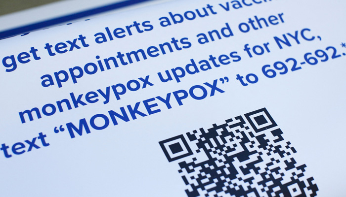 Informational posters are displayed on the tables before the opening of a Monkeypox mass vaccination site at the Bushwick Educational Campus in Brooklyn on July 17, 2022 in New York City. -AFP