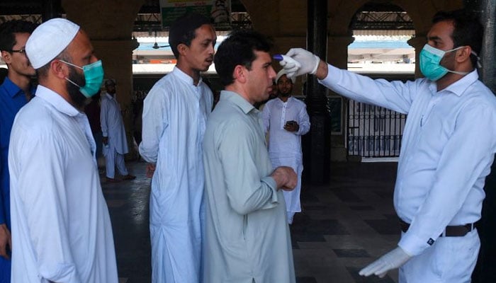 Pakistans COVID-19 positivity rate drops to 2.74%. Photo: AFP/file