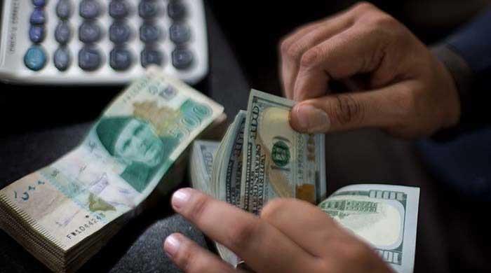 Dollar breaks all records to close at Rs232.93 in interbnak market