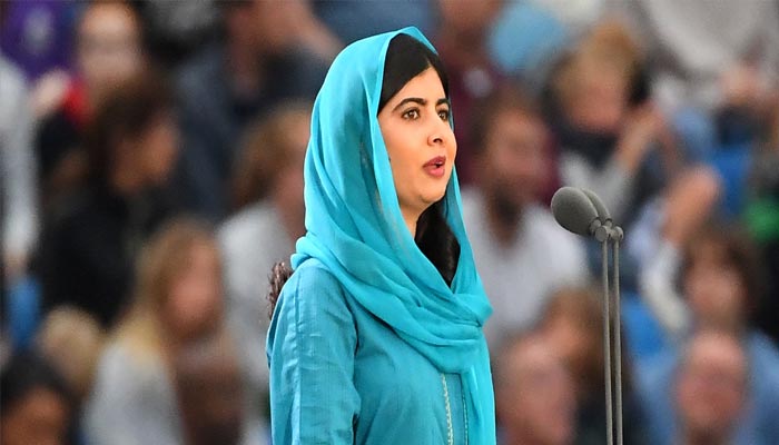 Pakistani activist for female education and a Nobel Peace Prize laureate Malala Yousafzai, speaks during the opening ceremony for the Commonwealth Games, at Alexander Stadium in Birmingham, central England, on July 28, 2022. — AFP