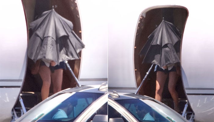 Taylor Swift hides under umbrella as she gets off private jet amid controversy