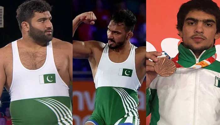Pakistani wrestlers: (from left) Zaman Anwar, Inam Butt and Inayatullah. Photo: Geo News/File