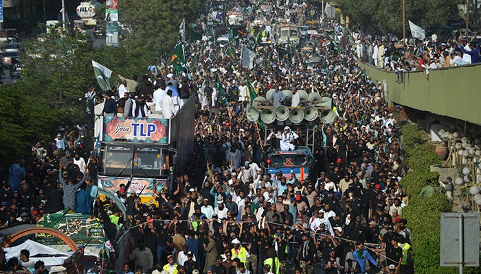 Activists of Tehreek-e-Labbaik Pakistan (TLP) march during a protest against the hike in price of essential commodities in Karachi. — AFP/File