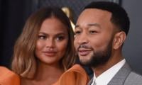 John Legend dishes on why he was hesitant to share pregnancy loss news