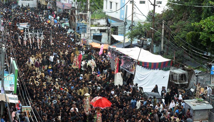 Mourners participate in the procession on the tenth day of Ashura during the Islamic month of Muharram, in Hyderabad on August 9, 2022. — AFP/File