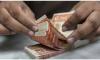 Rupee continues to gain ground against dollar, closes at 221.91 in interbank