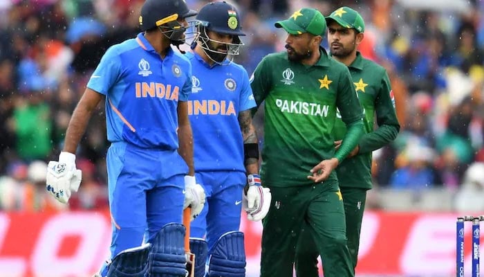 A representational image of Indian and Pakistani players speaking to each other after a match. — AFP/File