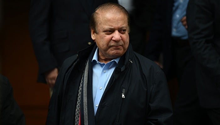 Former prime minister Nawaz Sharif (3L), brother of Pakistans current Prime Minister Shehbaz Sharif, leaves property in west London on May 11, 2022. — AFP