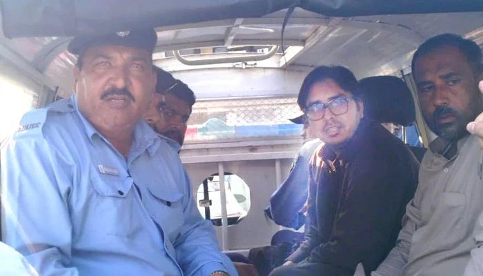 In this photo, PTI leader Shahbaz Gill can be seen seated in a police van. — Twitter/@ChaudhryZiaPTI