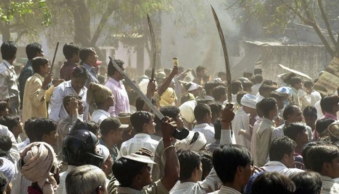 Hindu right-wingers can be seen marching with swords during the Gujarat riots in 2002. — AFP/File