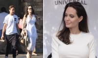 Angelina Jolie looks elegant in white as she goes on shopping with son Knox in Los Feliz