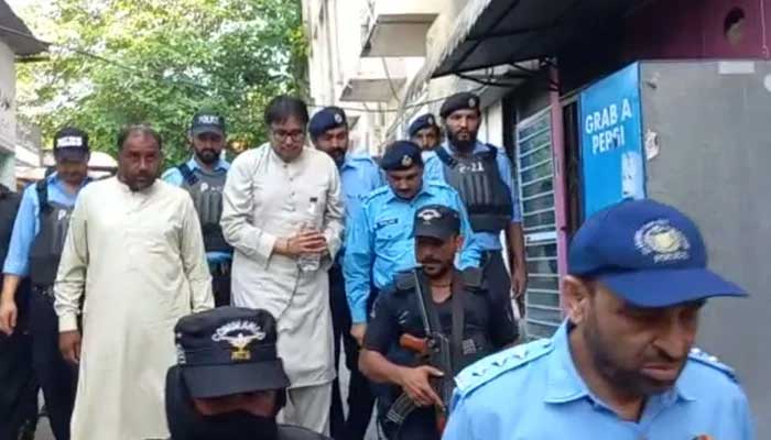 PTI leader Shahbaz Gill is being taken to a court in Islamabad, on August 10, 2022. — Photo: Geo News